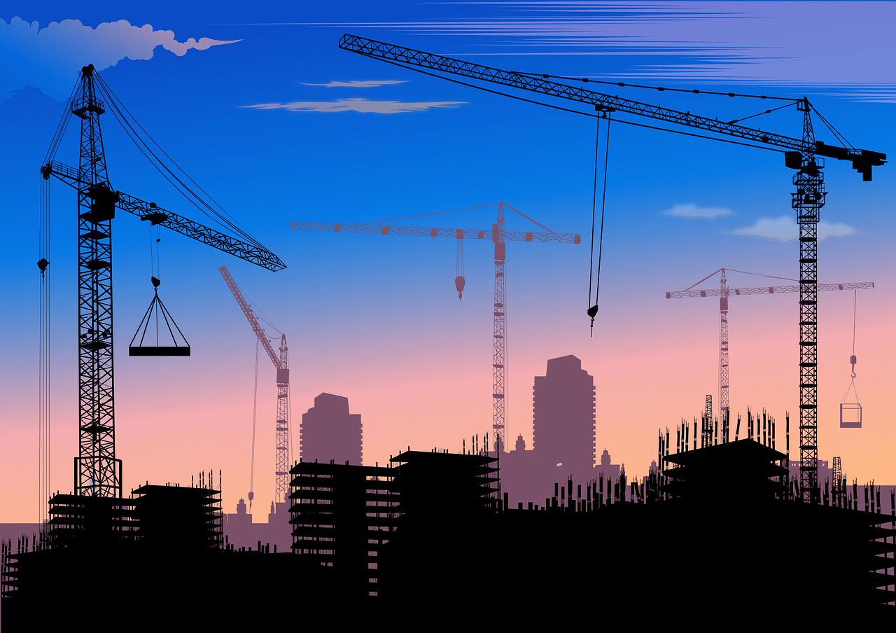 des immeubles en construction avec des grues